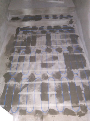 Монтаж теплого пола в душевой